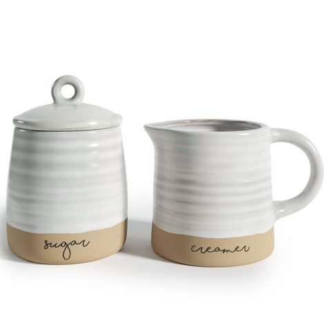 PRICES MAY VARY. Ceramic Sugar and Creamer Set - This creamer and sugar set is part of our exclusive Maribelle Stoneware Collection. With a fresh and earthy palette, this creamer pitcher and sugar dish will add an artisan-inspired style to your decor. Farmhouse-Style Decor - Serve your guests in style with these coffee sets for serving. The two-toned creamer container and sugar bowl set, with their organically crafted details, will add a farmhouse touch to your kitchen decor. Eye-catching Coffee Creamer Container, Sugar Container, Coffee Serving, Sugar Bowls And Creamers, Vintage Farmhouse Kitchen, Ceramic Pitcher, Cream And Sugar, Coffee Set, Vintage Farmhouse