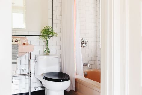 How much does a small bathroom renovation cost? We're sharing the REAL numbers, the final cost, and how we 'Bring It Home.' via Yellow Brick Home in partnership with Citizens Bank Pink Tub Bathroom, Update Old Bathroom, Bathroom Colour Ideas, Half Bath Renovation, Bathtub Shoot, Pink Sink, Pink Bathroom Vintage, Update Bathroom, Pink Bathroom Ideas