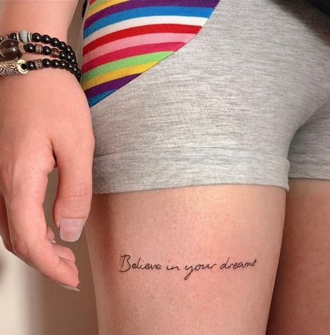 Thigh Quote Tattoos For Females Front Thigh Quote Tattoo Women, Thigh Tattoos With Quotes, Thighs Tattoos For Women, Thighs Tattoo Women, Tattoo For Legs Woman, Thigh Small Tattoo, Thigh Quote Tattoos, Small Thigh Tattoos Quote, Front Thigh Tattoos Women Quotes