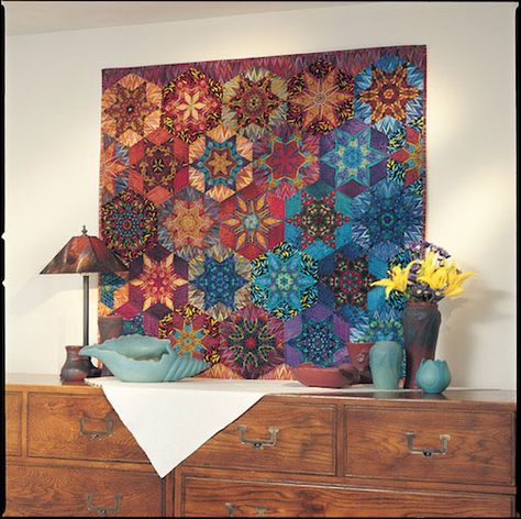 Enjoy the Luminosity Stars digital pattern from Love of Quilting Quilt artist Jeri Riggs created this attractive wall quilt of kaleidoscopic hexagons as a way to play with the infinite motif combination in the fabrics she chose. Kaleidoscope Quilts, Unique Quilt Pattern, Millefiori Quilts, Quilting Digest, Quilt Pattern Book, Quilt Display, Kaleidoscope Quilt, Stars Quilt, Quilt Pattern Download