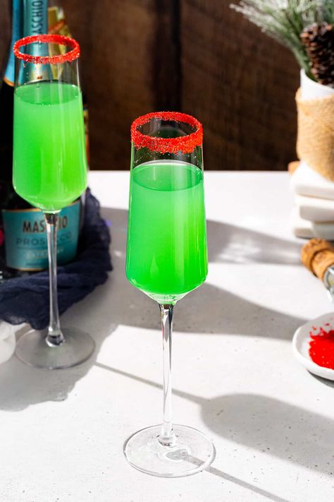 Grinch Cocktail With Blue Curacao, Grinch Mimosa Recipe, Grinch Mimosa, Prosecco And Orange Juice, Cocktails With Blue Curacao, Green Mimosa, Holiday Mimosa, Grinch Cocktail, Grinch Drink