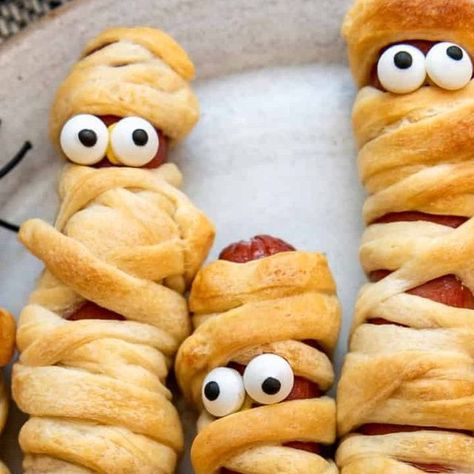 Amy Nash on Instagram: "If you never had mummy dogs during October when you were growing up did you even have a childhood? I'm totally kidding, but seriously these are such a fun way to have a Halloween-themed meal or snack that everybody loves! I mean, we say we make these "for the kids" but truth be told my husband and I both love them just as much. They are just full-size versions of pigs-in-a-blanket that take less than 15 minutes to make!

For the full post, click on the link in the -> @houseofnasheats <- bio, or search "Mummy Dogs" on houseofnasheats.com.

https://houseofnasheats.com/mummy-dogs/

#houseofnasheats #mummydogs #pigsinblankets #hotdogs #halloween #halloweenfood #halloweensnacks #kidsparty #nomnomnom #kidsfood #kidapproved #bhgfood #feedfeed #abmfoodie #huffposttaste #tas Dog Soup, Mummy Dogs, Big Pigs, Halloween Mummy, Pigs In A Blanket, Halloween 2024, Halloween Snacks, Truth Be Told, Charcuterie Board