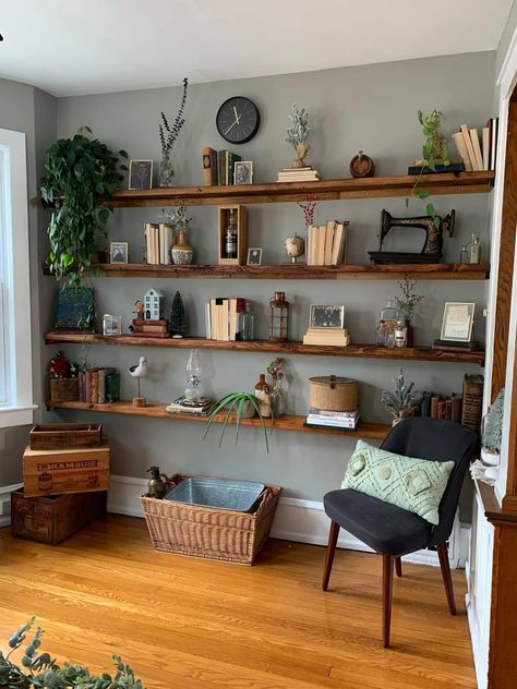 Library Inspired Living Room, Book Shelves Living Room Wall, Boho Office Shelves, Indoor Shelving Ideas, Floating Shelves On Long Wall, Live Edge Library Shelves, Boho Wall Shelves Living Room, Wall Bookshelf Decor, Home Library Floating Shelves