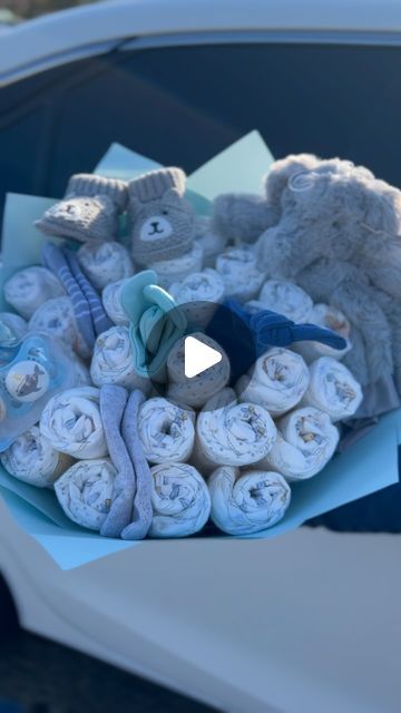 Flowers,Treats,backdrop set ups on Instagram: "Diaper bouquet 🩵 - - - - - #diaperbouquet #babyshower #reels #reelsinstagram #explore #explorepage" Diaper Bouquet, Nappy Cake, April 20, Rose Bouquet, Bouquets, Ups, Cake, Dogs, Flowers