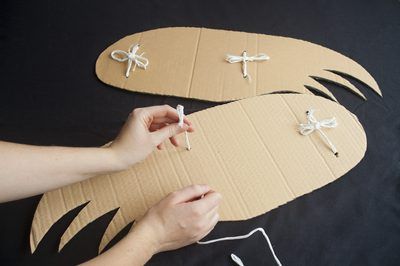 How to Make Wings for a Bird Costume. Wings are a main component of a bird costume, and an easy element to make. The most important parts of a bird wing are the shape and texture. A feathery element attached to the right shape creates a very authentic look. Look at pictures of the specific bird you are making wings for as inspiration for your... Bird Wings Diy, Bird Costume Kids, How To Make Wings, Eagle Costume, Bird Wings Costume, Wings Diy, Bird Tattoo Men, Owl Wings, Diy Wings