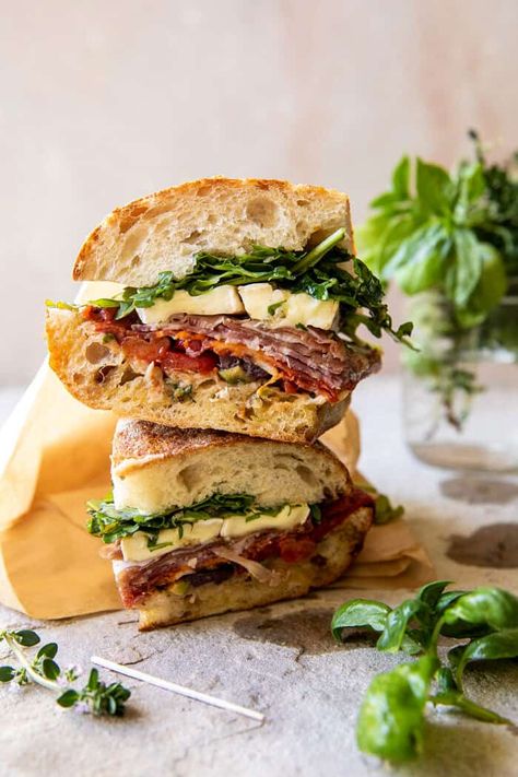 Picnic Style Brie and Prosciutto Sandwich | halfbakedharvest.com Hot Baguette Sandwich, Crusty Bread Sandwich, Gourmet Lunch Sandwiches, Italian Prosciutto Sandwich, Fancy Picnic Sandwiches, Prosciutto Ciabatta Sandwich, Italian Picnic Sandwich, Ciabatta Prosciutto Sandwich, Baguette Sandwiches Ideas