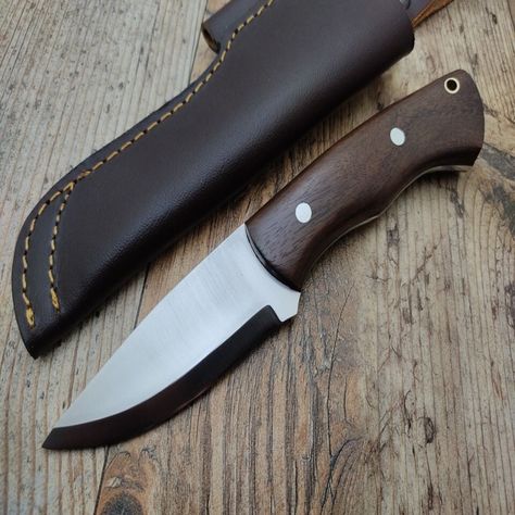 Upgrade your outdoor gear with our custom handmade bushcraft survival camping hunting knife. Available in 1095 steel or 12C27 steel, this fixed blade knife features a drop point blade with a scandi grind. Perfect for hunting, camping, and everyday carry. Comes with a sheath and lanyard hole. #customknife #handmadeknife #bushcraftknife #survivalknife #campingknife  #Survival #Hunting #EverydayCarry #FixedBlade #Camping #Outdoor #Handmade #Bushcraft #Combat #Custom #Vintage #Skinner #Bowie #Boot 1095 Steel, Bushcraft Gear, Survival Camping, Bushcraft Knives, Drop Point, Custom Knife, Camp Knife, Handmade Knives, Fixed Blade Knife