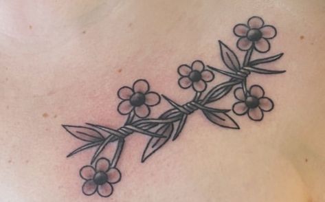 barbed wire mixed with vine and flowers Barbed Wire Flowers Tattoo, Barb Tattoo Wire, Flower And Barbed Wire Tattoo, Barb Wire And Flowers Tattoo, Flower Barbed Wire Tattoo, Barbed Wire And Vine Tattoo, Barbed Wire Tattoo With Flowers, Floral Barbed Wire Tattoo, Barb Wire With Flowers Tattoo