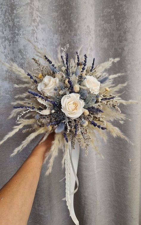 This Wedding Bouquets item by AtelierAnnaHandmade has 34 favorites from Etsy shoppers. Ships from Germany. Listed on Jan 4, 2024 Blue And Cream Wedding Bouquet, Western Wedding Bouquets Blue, Dusty Blue And Champagne Wedding Colors, Champagne And Blue Wedding Colors, Blue Tan Wedding, Blue And Beige Wedding, Champagne And Blue Wedding, Bridal Bouquet Lavender, Blue Boho Wedding