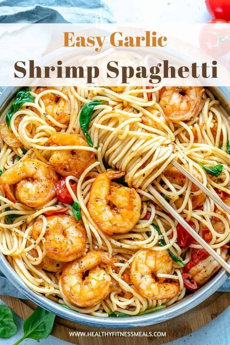 Garlic shrimp tossed in a delectable and light dressing, served with golden pasta. This Shrimp Spaghetti is the perfect weeknight meal that's easy to make, delicious, and oh so satisfying. Have dinner ready in just 30 minutes with this easy pasta dish. #shrimprecipe #shrimpspaghetti #pasta #shrimppasta via @healthyfitnessmeals Macro Friendly Shrimp Pasta, Garlic Shrimp Spaghetti, Baked Shrimp Recipes Healthy, Shrimp Pasta Primavera, Whole30 Shrimp Recipes, Clean Eating Shrimp, Low Carb Shrimp Recipes, Buttered Shrimp Recipe, Baked Shrimp Recipes