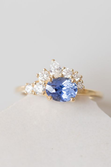 A bright cornflower blue sapphire is accented with an arched cluster of round and pear shaped white diamonds. See more pictures of this ring here! Cornflower Blue Sapphire Engagement Ring, Cornflower Sapphire Ring, Cornflower Sapphire, Cornflower Blue Sapphire, Sapphire Silver Ring, Blue Sapphire Engagement Ring, Blue Engagement Ring, Pear Shaped Ring, Diamond Cluster Engagement Ring