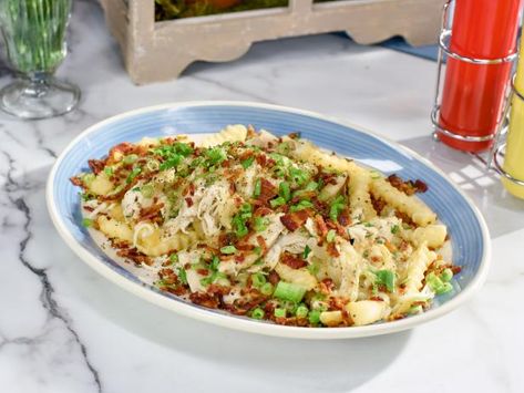 Get Sunny's Loaded Disco Fries Recipe from Food Network Disco Fries Recipe, Disco Fries, Easy Hollandaise Sauce, The Kitchen Food Network, Sunny Anderson, Creamy Coleslaw, Diner Recipes, Fries Recipe, Potato Dishes