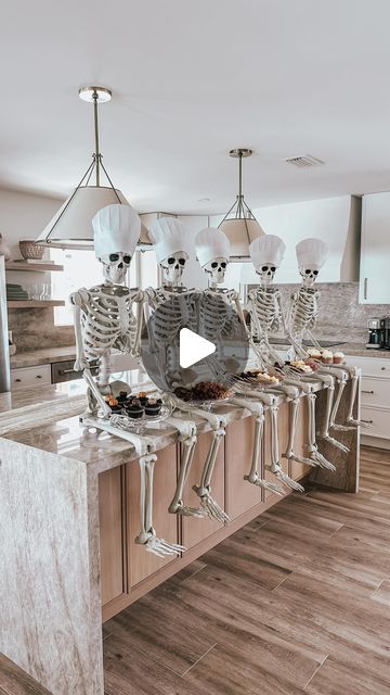 Jen Alvarez • Home Decor on Instagram: "Our skeleton crew is on duty, serving up chills and thrills on cake stands that are to die for 💀 Want to snag these spooky must-haves? Drop a ‘SKELETON’ in the comments for the deets to shop! & tag me if you do this for your Halloween party 🤍🕸️ 

Shop in bio on my @shop.ltk

#halloweenparty #halloweenpartyideas #halloweenpartydecor #halloweendecor #ltkhome #ltkunder50 #ltkhalloween #halloweenkitchen #halloweendecor #halloweeninspo" Skeleton Decor Ideas, Halloween Skeleton Food Display, Halloween Appetizer Table, Skeleton Food Display, Skeleton Halloween Table Decorations, Skeleton Kitchen, Halloween Kitchen Island Decor, Skeleton Party, Skeleton Food Platter