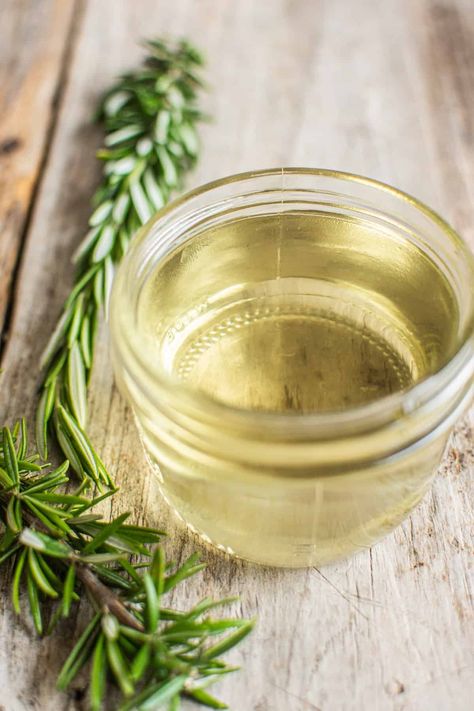 a jar of yellow syrup next to rosemary sprigs. Basil Simple Syrup, Rosemary Syrup, Simple Syrups, Rosemary Simple Syrup, Mint Simple Syrup, Glaze For Cake, Syrup Recipes, Simple Syrup Recipes, Make Simple Syrup