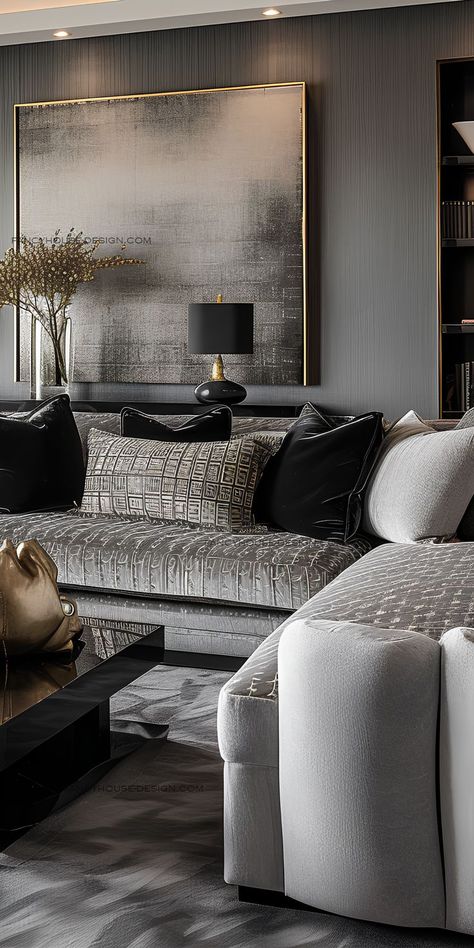 Sophisticated gray tones create a chic backdrop for the living room's contemporary design elements.