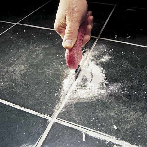 Is the grout between your floor tiles cracking or, worse, crumbling away? There are a few probable causes, but before you tear up the tile and start over, try this quick fix. Remove Tile, Grout Repair, Floor Grout, Tile Repair, The Family Handyman, Home Fix, Tile Grout, Family Handyman, Diy Home Repair