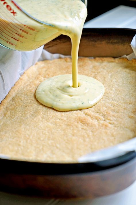 Cuban Mojito Shortbread Bars - These mojito shortbread bars get a bump in Latin flavor with a mojito inspired custard of eggs, sweetened condensed milk, lime juice and fresh mint with a little rum extract. Feel free to use your favorite rum if you like. These deliver on hitting the mark on flavor and filling that sweet tooth. Key Lime Desert, Cuban Mojito Recipe, Key Lime Shortbread Bars 12 Tomatoes, Lime Drink With Sweetened Condensed Milk, Coconut Mint Mojito, Cuban Mojito, Cuban Desserts, Cuban Dishes, Cuban Cuisine