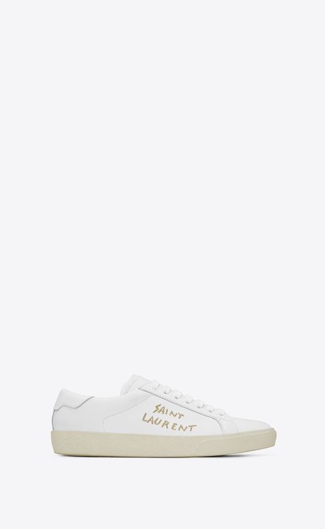 Saint Laurent Court Sl/06 Sneaker In Optic White Leather And Gold Embroidery | YSL.com Luxury Sneakers Women, Styling Lookbook, Saint Laurent Court Classic, Preppy Closet, Saint Laurent Store, Saint Laurent Sneakers, Embroidered Sneakers, Sneakers Luxury, Luxury Sneakers