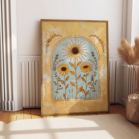 🌞 Sun Art Poster - Mystical Sunflowers Folk Illustration 🌻✨ Transform your space into a haven of warmth and enchantment with our Sun Art Poster! 🌞✨ This folk illustration print features a radiant sun and ethereal sunflowers 🌻, exuding spiritual and mystical vibes. Perfect for those who adore vintage boho decor, this artwork adds a touch of floral magic to any room. 🌼🌿 🌻 Key Features: High-Quality Print: Printed on premium paper for vibrant colors and lasting quality. 📜 Folk Illustration: Vintage Boho Bedroom, Wall Art Earth Tones, Folk Art Illustration, Bedroom Canvas Art, Art Soleil, Vintage Inspired Wall Art, Illustration Kunst, Earth Tone Wall Art, Sunflower Wall Art