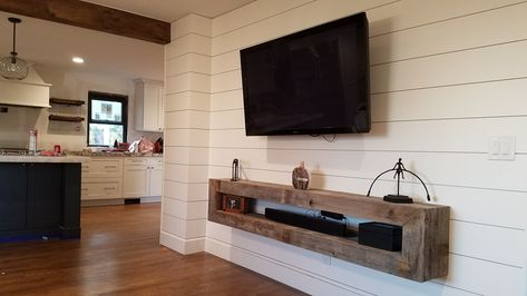 Entertainment Center Under Mounted Tv, Floating Shelf Beneath Tv, Floating Entertainment Shelf, Wooden Shelf Under Tv On Wall, Reclaimed Wood Entertainment Center, Floating Wall Tv Unit, Ideas For Under Mounted Tv, Large Wall Mounted Tv Ideas, Floating Mantel Under Tv