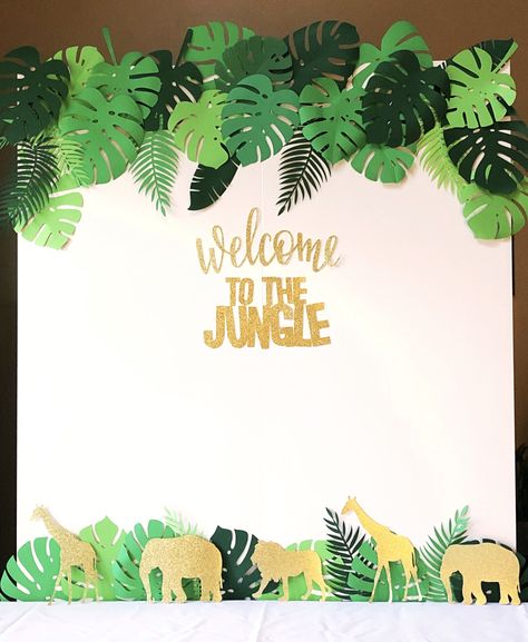 Paper Leaves and Animals for your Jungle Theme Party Wall Decor! A Fun Jungle Backdrop will brighten up any event. DIY with tropical paper leaves and your favorite glitter card stock jungle animals. #jamelloveandpaper #junglethemeparty #paperleaves #diy #animals Jungle Theme Wall Decor, Jungle Theme Decorations Backdrops, Safari Backdrop Diy, Jungle Party Backdrop, Diy Jungle Leaves, Jungle Backdrop Diy, Rainforest Birthday Party Ideas, Safari Theme Backdrop Ideas, Jungle Theme Birthday Party Diy