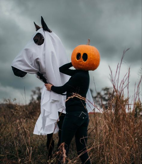 Ghost horse, pumpkin head, photo shoot, fall, spooky, Horse costume, Halloween costume Halloween Photoshoot With Horse, Costume Ideas With Horses, Spooky Horse Photoshoot, Horse Ghost Costume, Halloween Costumes With Horses, Horse And Human Halloween Costumes, Horse Halloween Photoshoot, Horse Halloween, Horse Pumpkin