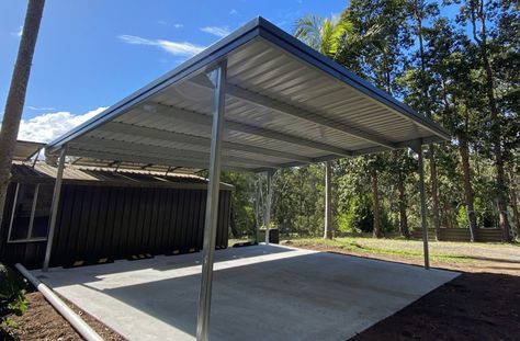 This Skillion Roof Carport in the ColorBond colour Ironstone is a practical solution to store your caravan during the off season, or be the perfect space to provide shelter for your cars if you have a larger family. This essential addition provides reliable protection and shelter, ensuring your caravan or car remains in optimal condition until your next adventure all the while being sheltered from Mother Nature Cactus Garden Design, Skillion Roof, Mini Barn, The Off Season, Carport Garage, Long Run, Cactus Garden, Garage Workshop, How To Run Longer