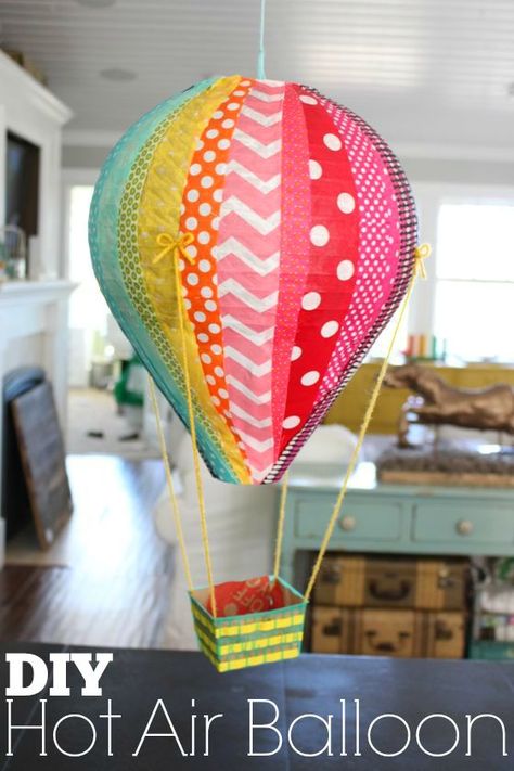 if you know me and DIY’s, you know you’re in for a long post! i’m not just going to show you how to make one hot air balloon, i’m going to show you how to make 17 different balloons!  3 or 4 times a y Ballon Pinata, Balloon Pinata, Hot Air Balloon Craft, Diy Hot Air Balloons, Hot Air Balloon Party, Hot Air Balloon Decorations, Kraf Kertas, Balloon Crafts, Mini Balloons