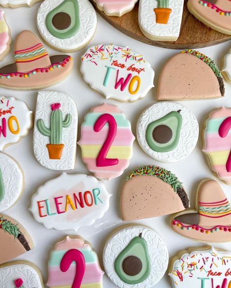 Taco Twosday (on a Monday!) 🌮 🌵 🥑 Complete with plenty of tacos, the cutest wet on wet avocados, hand cut sombreros and lots of fun… | Instagram Taco Second Birthday Party, 2nd Birthday Taco Party, Taco Themed 2nd Birthday Party, Two Taco Birthday Party, Taco About Two Birthday Girl, Taco About Two Birthday, Time Two Fiesta Party, Second Birthday Party Girl, Taco Twosday Cookies