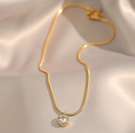 Lumière Lumière Necklace: Elevate your style with our elegant, gold plated necklace. Its anti-tarnish and hypoallergenic properties ensure long-lasting wear. Made with stainless steel and water resistant, this chic piece offers both beauty and durability. Perfect for any occasion. #ａｅｓｔｈｅｔｉｃ #jewellery #foryou #giftideasforher #pinterest #smallbusinessfinds Aesthetic Jewellery, Gold Plated Necklace, Elevate Your Style, Your Style, Gold Plate, Water Resistant, Long Lasting, Stainless Steel, Water