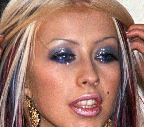 Y2K DAILY 🍒 on Instagram: “Some of Christina Aguilera’s most memorable eye makeup looks in the 2000s” 2000s Y2k Makeup, 2005 Makeup Looks, Y2k Trashy Makeup, Eurotrash Aesthetic, Snooki Makeup, 2000s Eye Makeup, 2000 Makeup Trends, 2005 Makeup, Early 2000s Makeup Trends