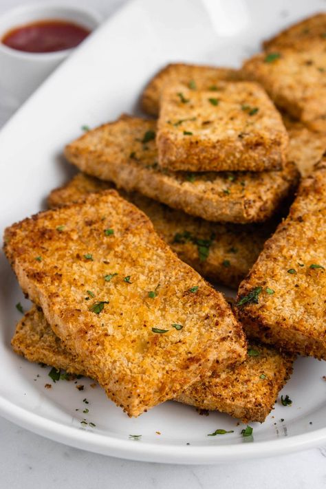 My Crispy Tofu recipe is super easy to make and delicious. It's crispy on the outside and soft in the middle. I show you how to make this in the air fryer and bake it in the oven. This will make you fall in love with Tofu. #tofu #vegan #howtomaketofu Tofu Air Fryer, Air Fryer Tofu, Breaded Tofu, Tofu Burger, Tofu Steak, Tofu Chicken, Tofu Sandwich, Steak Sandwiches, Air Fryer Recipes Vegetarian