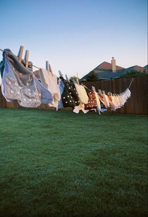 Cloth diapers on film hanging on the clothes line drying in the texas sun. sustainable vintage aesthetic. Motherhood. Laundry Line Photoshoot, Drying Clothes Outside Aesthetic, Clothes Line Photoshoot, Clothes Line Aesthetic, Clothing Line, Clothesline Aesthetic, Doing Laundry Photography, Laundry Lines Outdoor Aesthetic, Line Drying Clothes