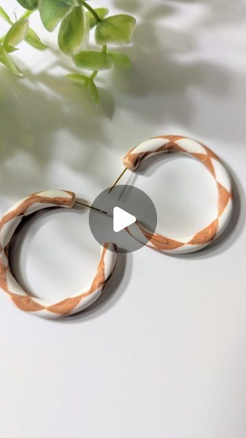 Saheli Paul on Instagram: "Part 2: Let's make hoop earrings using a checkerboard patterned polymer clay slab. 🤍🤎  This is my first attempt at making hoops using this technique. They did not turn out the best, but I will keep practicing this technique.  Love patterned hoops!!   #polymerclayhoops #polymerclayearrings #eotd #processvideo #polymerclayart #artistoninstagram" Hoop Earrings Polymer Clay, Polymer Clay Hoop Earrings Diy, Make Hoop Earrings, Polymer Clay Slab, Palmer Clay, Polymer Clay Hoop Earrings, Hoop Earrings Diy, Keep Practicing, Checkerboard Pattern