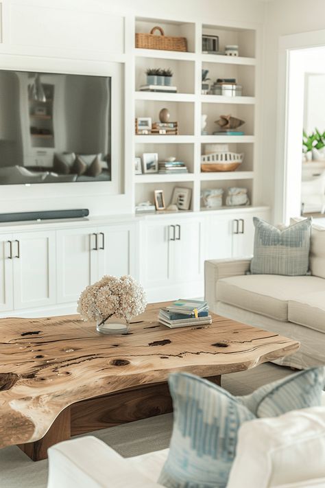 living room with built ins around TV and driftwood coffee table In Wall Shelves Living Room, Built Ins Around Tv, Living Room With Built Ins, In Wall Shelves, Built In Wall Shelves, Coastal Coffee Table, Wood Bowl Decor, Wall Shelves Living Room, Driftwood Coffee Table