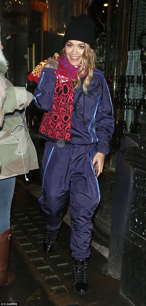 (Shell) suits you! Rita ditched her usually racy outfits to cover up in a retro shellsuit combined with a huge scarf Shell Suit, Casual Date, Shiny Clothes, Rita Ora, Music Producer, Her Music, Put On, Suits You, Cover Up