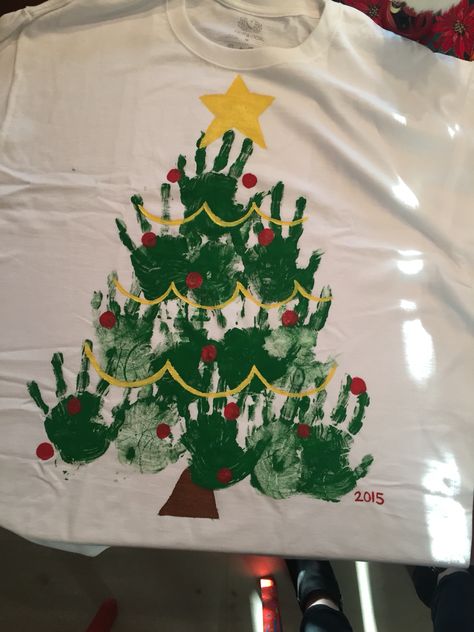 Christmas tree handprint shirt Christmas Tree Shirt Diy, Christmas Tree Handprint, Handprint Shirt, Tree Handprint, Diy Christmas Shirts, Diy Ugly Christmas Sweater, Christmas Dress Up, Handprint Christmas, Diy Preschool