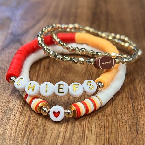 "This Chiefs bracelet set will surely add to all the game day attire perfect!  Your Chiefs a different color combo? No worries, just leave info in the personalization section!! These are standard 7\" but can be made to any requested size." Kc Chiefs Bracelets, Chiefs Clay Bead Bracelet, Kc Chiefs Bracelet, Kansas City Chiefs Bracelets, Good Color Combos For Bracelets, Chiefs Bracelet Ideas, Midnight Bracelets, Chiefs Bracelet, Kansas City Chiefs Jewelry