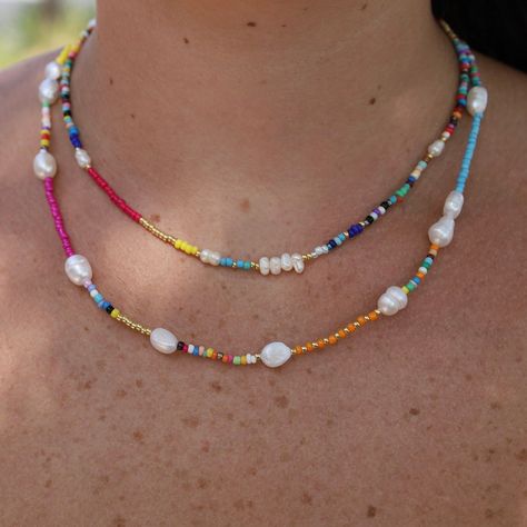 This Freshwater Pearl Beaded Colorful Rainbow Necklace is perfect to add a pop of color to any outfit! Layer with the Colorful Rainbow Beaded Necklace with Freshwater Pearl for an elevated look! 9mm freshwater pearls strung with color beads 16" chain with 2" extender Lobster claw closure 14k gold over sterling silver, lead and nickel free Fun Beaded Necklaces, Rainbow Beaded Necklace, 16 Necklace, Diy Jewlery, Jewelry Design Inspiration, Bead Necklaces, Rainbow Necklace, Jewelry Post, Color Beads