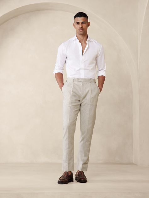 Designed with warm climates in mind, this sleek white suit pant is cut from an herringbone fabric that blends together soft cotton and luxurious linen.  Tailored Slim Fit: Mid-rise.  Tapered slim leg.  Zip fly with button-tab waistband.  Belt loops and after-dinner split detail at back.  Front and back pockets.  Half lined (lined to the knee).  Tailored Slim Fit: Mid-rise.  Tapered slim leg.  Inseams: Short 29. 5", Regular 31. 5", Long 33. 5" Model: Size 32 Regular, 6'2" (188cm). Mens Wedding Guest Outfit, Wedding Guest Outfit Men, Wedding Guest Men, Linen Pants Suit, Beach Formal, Formal Wedding Attire, Rehearsal Dinner Outfits, Linen Pants Outfit, Beach Wedding Attire