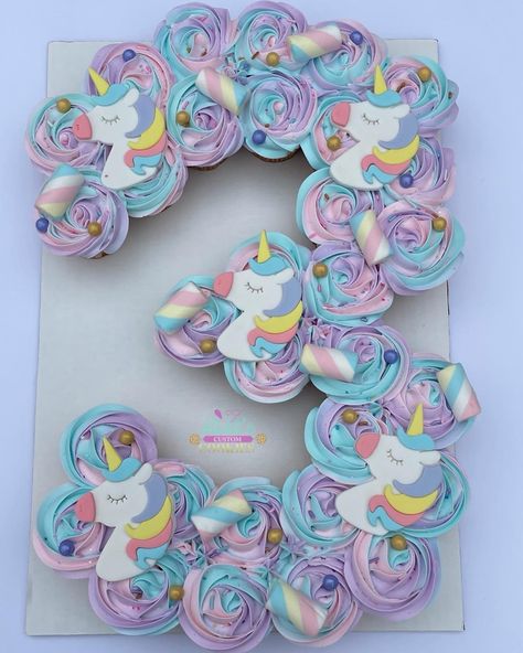 Unicorn cake, #3 cake, gumpaste, marshmellows Unicorn Cupcake Birthday Cake, Unicorn Cupcake Cake Ideas, Rainbow Unicorn Cupcakes Ideas, Unicorn Cupcake Cake Pull Apart, Unicorn Birthday Cake And Cupcakes, Pull Apart Unicorn Cake, Rainbow Unicorn Cupcake Cake, Unicorn Birthday Party Cupcakes, Unicorn Cake 3rd Birthday