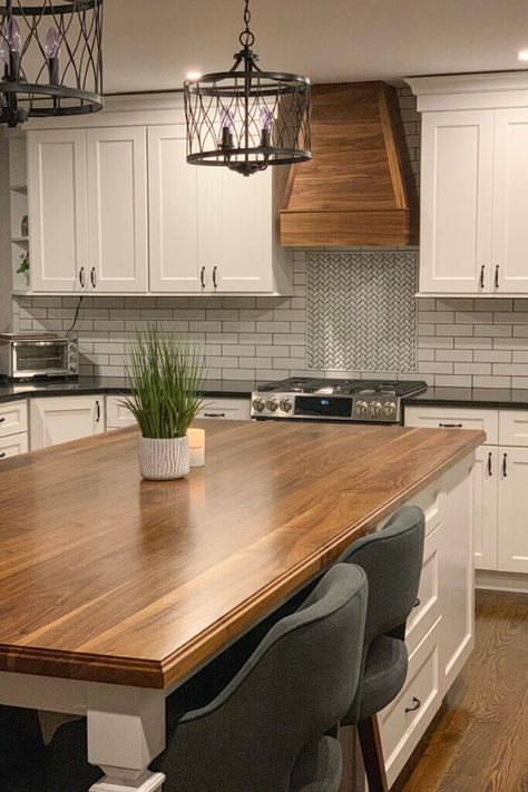 This modern kitchen with a rich wood island countertop and white tile backsplash perfectly compliments a minimalist style. Get superior craftsmanship from Excelsior Wood Products' detailed custom fabrication services and choose from racks of reclaimed wood. Kitchen Wood Top Counter, Green Island Butcher Block Top, Butcher Block Island With Sink, Island With Wood Countertop, Kitchen Island Wood Countertop, Kitchen Wood Countertop, White Kitchen Butcher Block Island, Kitchen With Wood Countertops, Wood Countertops Kitchen Island