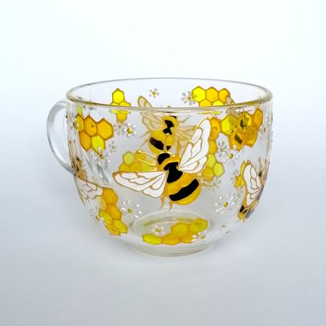 This hand painted bee and honeycomb coffee mug would be a useful and great gift for your Mom, sister, wife, Granny.... ! It can be personalized with the name or your text. If you want to add your name or text - write it while placing your order. Measurements: Height 8 cm / 3 inch About 500 ml / 17 oz I use non-toxic glass paints on water basis. I baked this mug in the oven to make it more durable. You can wash this mug in warm water with soft cleaners without mechanical effects and soaking. More Painted Office, Honey Packaging, Hand Painted Glassware, Glass Paintings, Glass Painting Designs, Glass Bottles Art, Painting Glassware, Mom Art, Bee Art