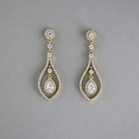 Glistening teardrop-shaped CZ earrings, crafted in layers of timeless beauty, will add a touch of subtle elegance to your bridal look. These earrings are rhodium or gold plated, hypoallergenic, lead, nickel, and cadmium free, and made with AAA CZ stones. They measure about 2 inches long and 5/8 inches wide and have post pierced backs. Wedding Day Earrings Brides, Bride Hair Down, Teardrop Bridal Earrings, Fav Products, Teardrop Jewelry, Weaving Ideas, Gold Earrings Wedding, Wedding Day Jewelry, Pinterest Ideas