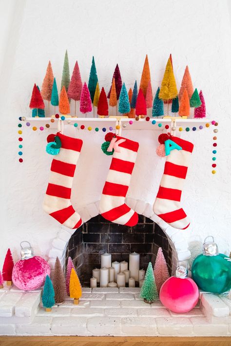 With a white brick fireplace, there is so much room to be playful with your Christmas decor because of the neutral decor. Striped Christmas Stocking, Advent Calendar Diy, Wool Stockings, Felted Christmas, Diy Stockings, Christmas Stockings Diy, Stockings Christmas, Modern Christmas Decor, Christmas Mantel Decorations