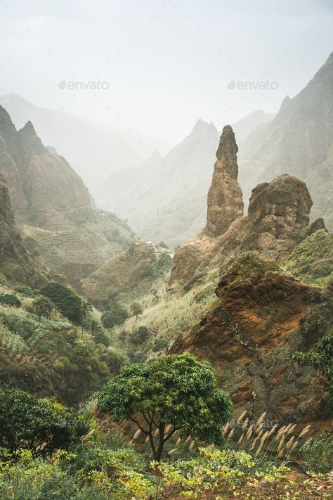 Mountain peaks of Xo-Xo valley of Santa Antao island, Cape Verde. Many cultivated plants growing in by Shunga_Shanga. Mountain peaks of Xo-Xo valley of Santa Antao island, Cape Verde. Many cultivated plants growing in the valley betwee... #AD #Santa, #Antao, #island, #valley Cape Verde Islands, Cap Vert, Cabo Verde, Plants Growing, Cape Verde, Mountain Peak, Scenery Nature, Mountain Village, Beautiful Scenery Nature