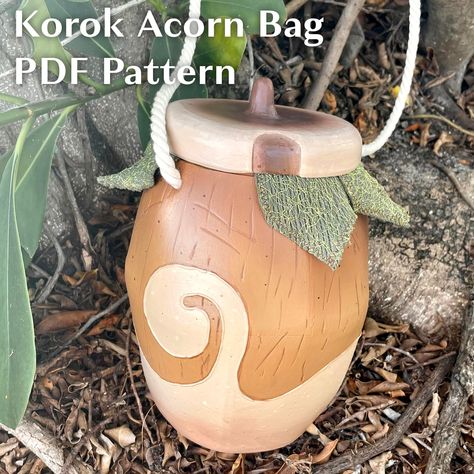 Make the cutest cosplay accessory (or everyday tote if you're whimsical like that) with this korok acorn bag PDF pattern! Perfect for holding all your convention necessities with room to carry all your korok seeds as well! Pattern for EVA foam build. This acorn can be seen in-game in the Korok Forest as well as scattered through Hyrule, where a korok is waiting to be found! Korok Cosplay, Winter Hat Sewing Pattern, Korok Forest, Korok Seed, Acorn Bag, Zelda Cosplay, Paper Mache Clay, Fantasy Costumes, Everyday Tote