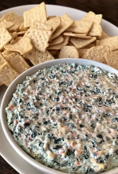 Ranch Spinach Dip Recipe  Ingredients  - 1 cup frozen chopped spinach, thawed and drained - 1 cup sour cream - 1 cup mayonnaise - 1 packet ranch dressing mix - 1 cup shredded cheddar cheese - 1/2 cup diced green onions - 1/2 teaspoon garlic powder  Full Cooking Instructions on... Spinach Dip With Ranch Packet, Recipes With Frozen Spinach, Cheddars Spinach Dip, Ranch Spinach Dip, Ranch Packet, Spinach Dip Recipe, Shredded Cheddar Cheese, Ranch Dressing Mix, Spinach Dip