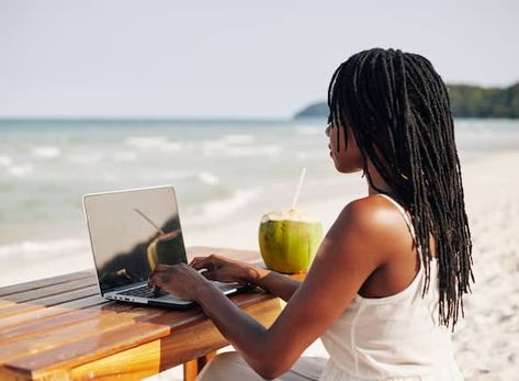 How to Work Remotely From Anywhere | Travel | Hilton Women With Dreadlocks, Working On Laptop, Travel Noire, Digital Nomad Life, Dragon Images, Pretty Females, Tropical Island, On Beach, Digital Nomad