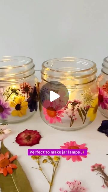 Aranya Aura on Instagram: "Diy requirements💝: 

1. Glass jar
2. Pressed flowers (read the bottom of the caption to know how to make) 
3. Battery candle 
4. Brown thread 
5. Glue mixture 

Turn your empty glass jars into beautiful lamps with this easy peasy diy💕✨ perfect to add some cozy vibes to your space🎀 

Process of making pressed flowers: 

1. Choose fresh, blemish-free flowers and trim them.
2. Place them between paper and press in a heavy book or flower press.
3. Leave them to dry for 1-4 weeks until completely crisp.
4. Carefully remove and store them in a dry place for use.

Try this diy today💕💝❤️🥰

#jarlamp #lamp #diylamp #lampdecor #lampart #handmadelamp #pressedflowers #pressedflowerart #pressedflower #pressedflowerlamp #lampart #décor" Glass Jar Lamps, Diy Candles With Flowers, Battery Candle, Beautiful Lamps, Battery Candles, Flower Press, Pressed Leaves, Pressed Flower Art, Handmade Lamps